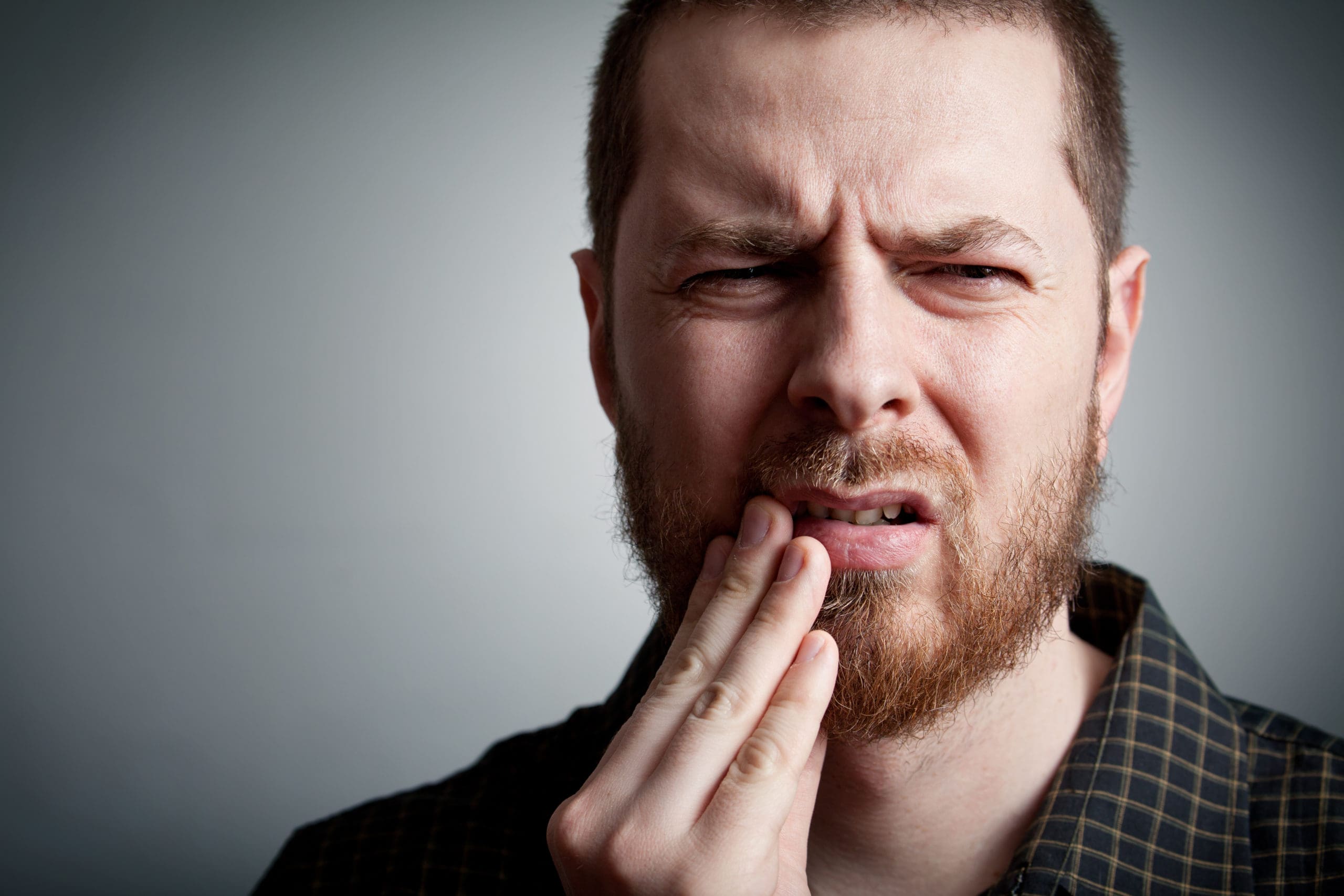 Toothache - man with teeth problems